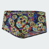 Speedo Men's 14cm swimming brief with multi-colour skulls digital print, front view showing contoured fit and drawstring.